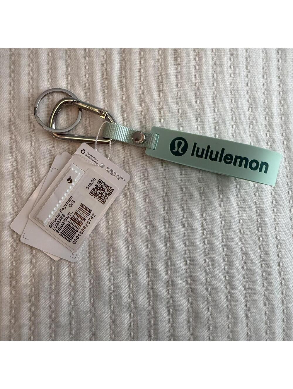 NWT Lululemon Silicone Keychain – Sea Mist/Sonic Teal "Live in the Moment"